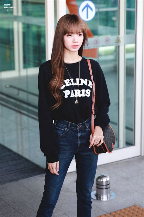 black pink lisa airport outfit.